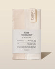 Banyo Kese exfoliating glove packaging on a beige background