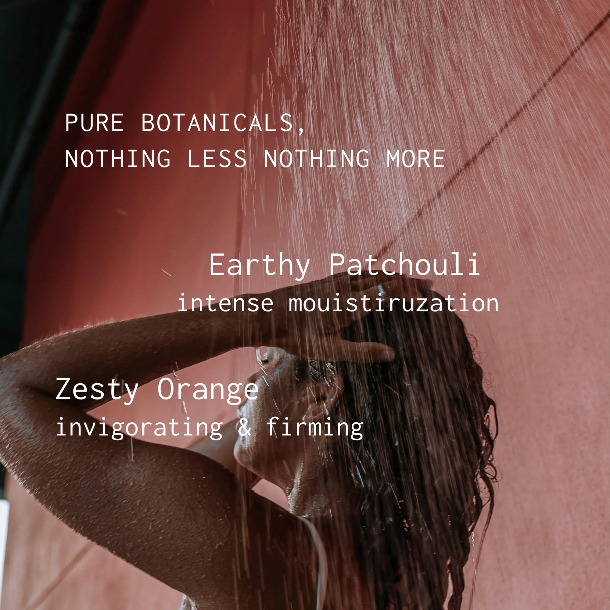 Person washing hair with text about Earthy Patchouli and Zesty Orange scents.