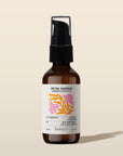 Bottle of Petal Woods Aromatic Body Oil by banyo on a beige background