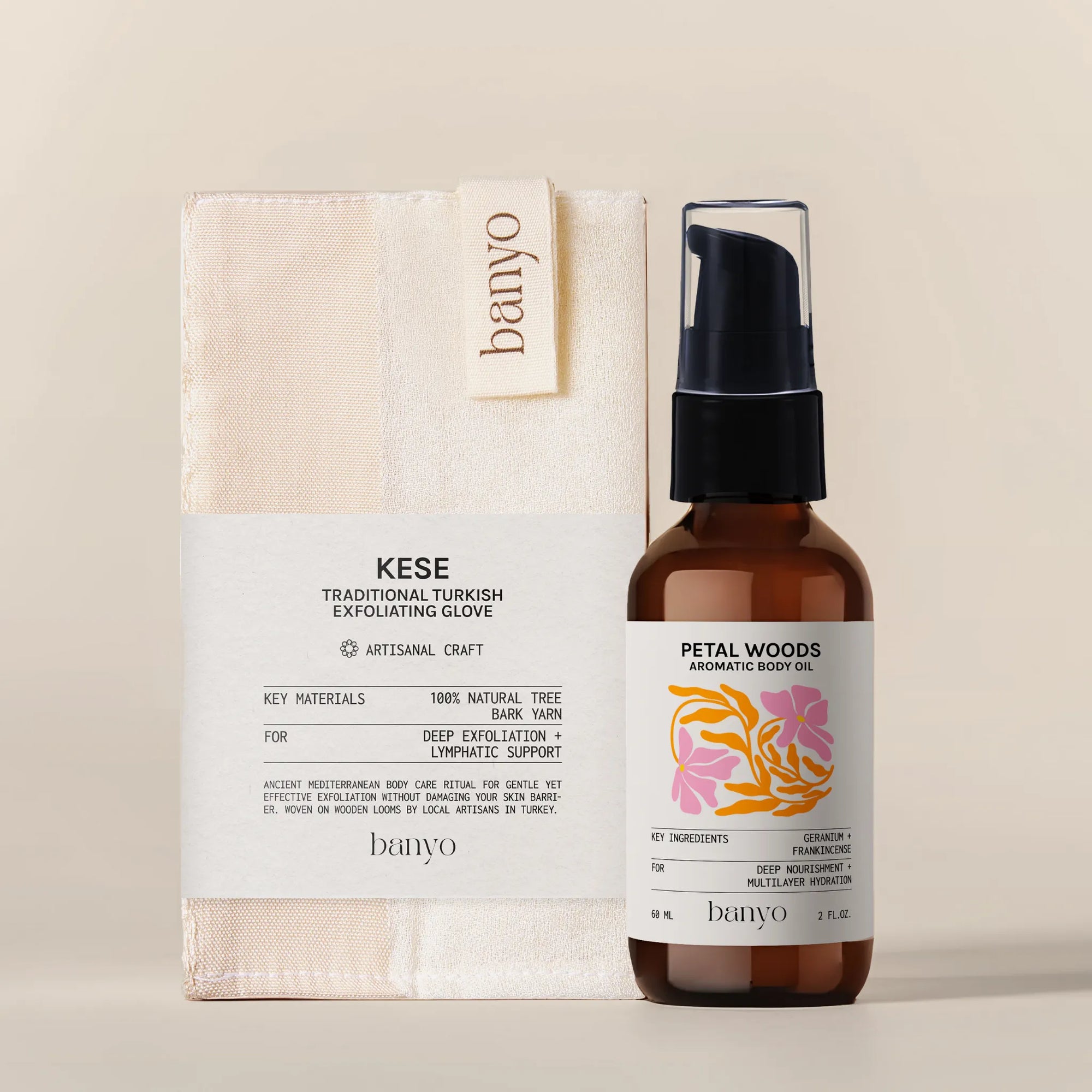 Banyo brand products including a Kese glove and Petal Woods body oil on a beige background
