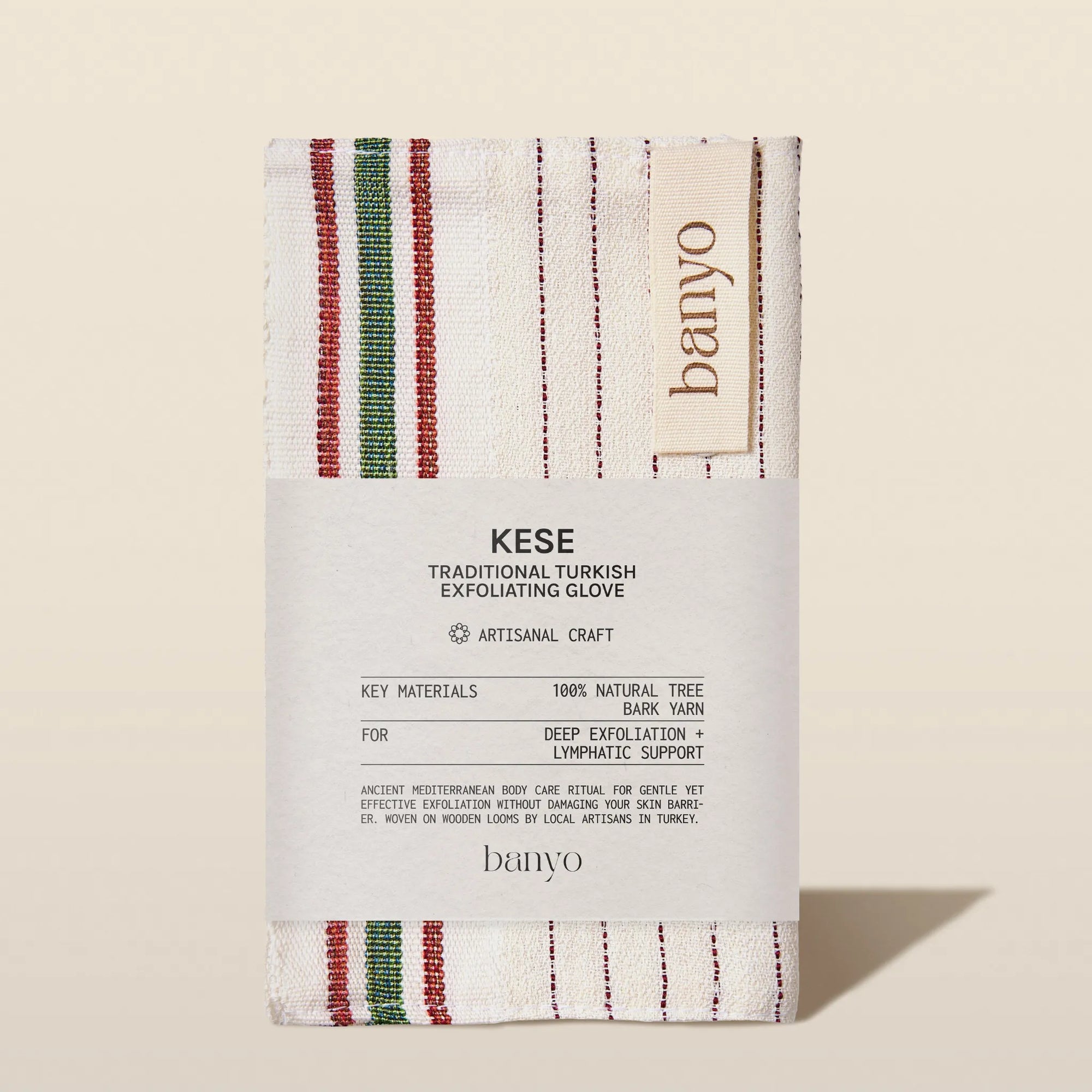 Kese traditional Turkish exfoliating glove packaging with 'banyo' branding on a beige background