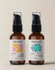 Two brown bottles of banyo aromatherapy body oils on a beige background