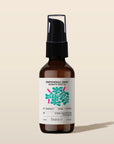 Bottle of Patchouli Zest Aromatic Body Oil by banyo on a beige background