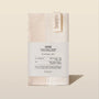 Banyo Kese exfoliating glove packaging on a beige background